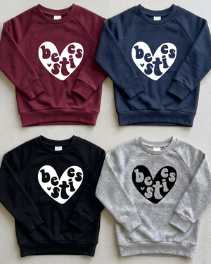 Besties crewneck flat lay with black print on heather grey