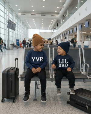 Brothers sitting together in the airport