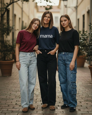 Three-woman photo with white lowercase mama lettering added to the center woman’s navy shirt
