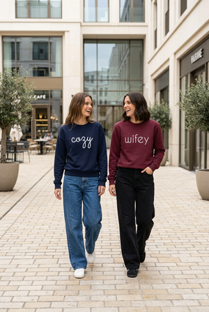 Women walking in custom cozy and wifey crewnecks